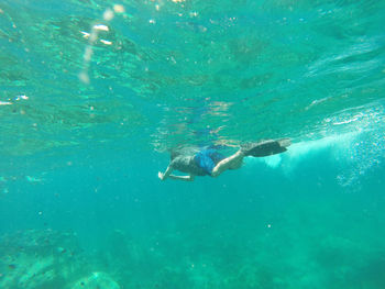 Man swimming in sea