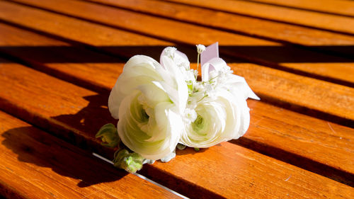 High angle view of white rose on table