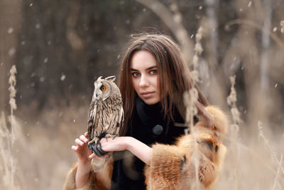 Portrait of woman in snow