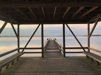 Pier over sea against sky