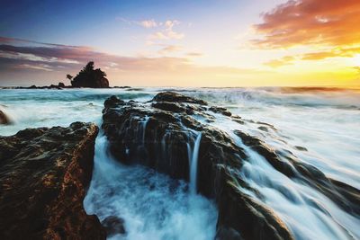 Scenic view of sea against sky during sunset