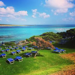 High angle view of calm blue sea against sky