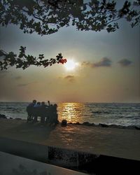 Scenic view of sea at sunset