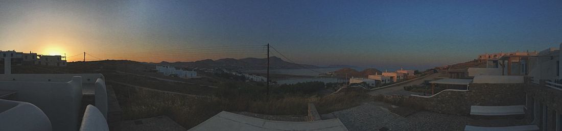 High angle view of town against sky during sunset