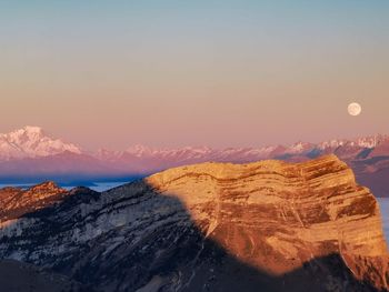 Scenic view of mountains against sky during sunset