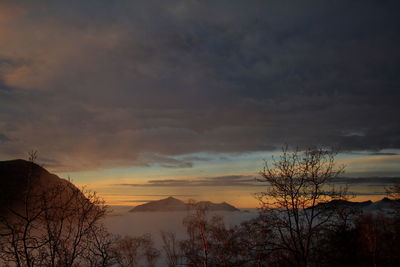 Scenic view of landscape against cloudy sky