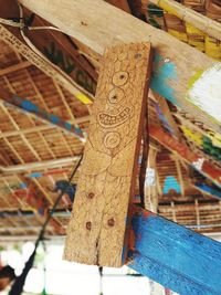 Close-up of text on wood