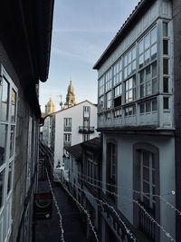 Canal amidst buildings in city