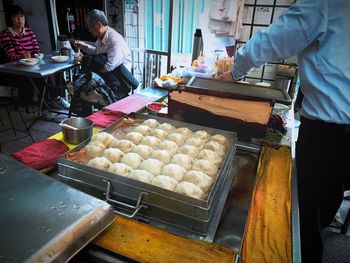 High angle view of man preparing food