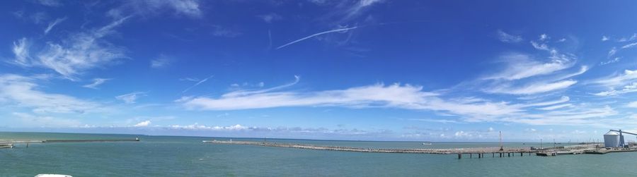 Scenic view of sea against blue sky