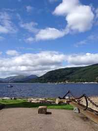 Scenic view of sea against cloudy sky