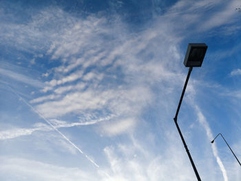 Low angle view of street light against sky