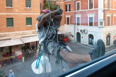 Full length of man outside building