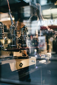 Close-up of machine part on table
