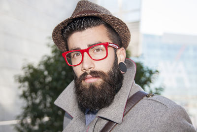 Portrait of young man wearing eyeglasses