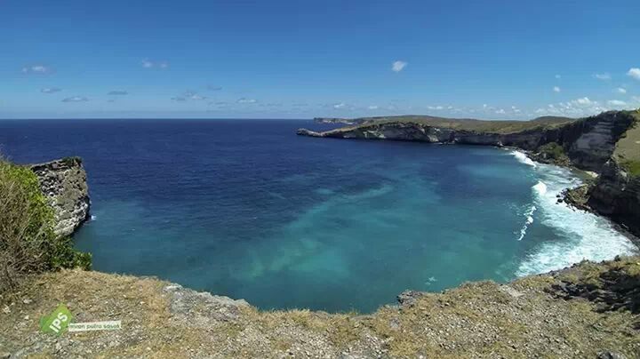 sea, water, horizon over water, scenics, tranquil scene, tranquility, sky, blue, beauty in nature, nature, coastline, beach, high angle view, idyllic, rock - object, shore, cliff, day, seascape, rock formation