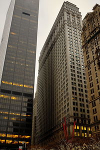 Low angle view of modern buildings in city