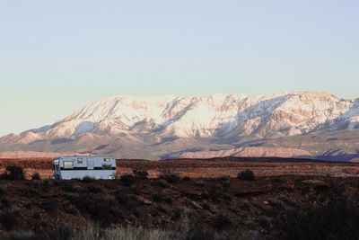 Scenic view of desert against clear sky