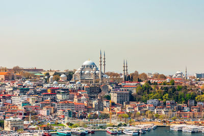 The european part of istanbul turkey, turkiye, panorama on sunny day. colorful houses with red roofs