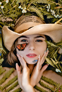 Portrait of woman wearing hat