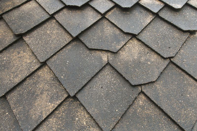 High angle view of tiled footpath