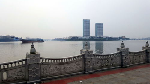 View of river with buildings in background
