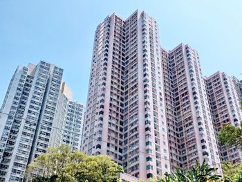 Low angle view of skyscrapers against sky