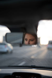 Reflection of car on road