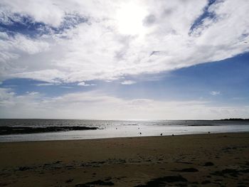 Scenic view of beach against sky