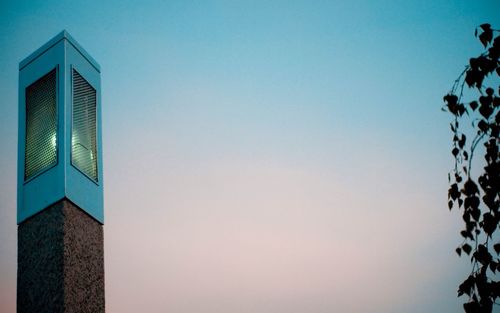 Low angle view of built structure against blue sky