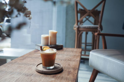 Close-up of coffee served on table at cafe