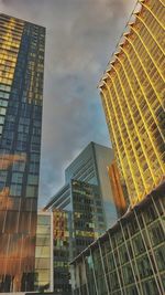 Low angle view of modern buildings against sky