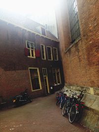 Bicycles parked on street outside house