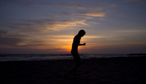 Scenic view of sea at sunset