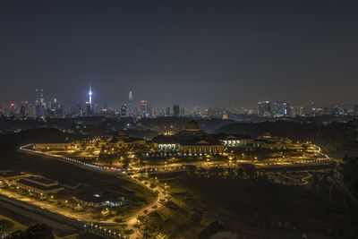 High angle view of illuminated cityscape at night