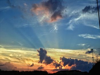 Scenic view of landscape against sky at sunset