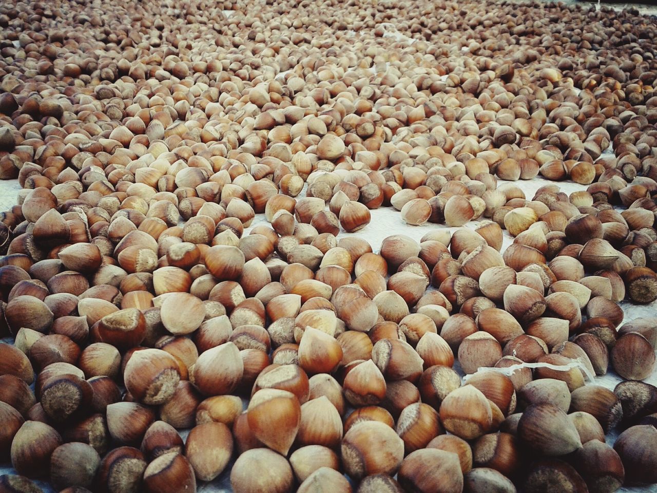 abundance, large group of objects, food and drink, food, full frame, backgrounds, freshness, high angle view, healthy eating, stone - object, brown, pebble, heap, stack, no people, day, still life, outdoors, close-up, nature