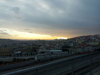 Cityscape against sky during sunset