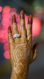 Close-up of woman hand with tattoo