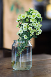 Close-up of glass vase on table