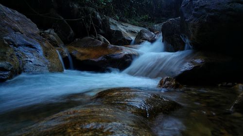 View of waterfall in forest