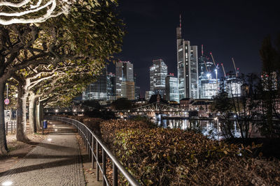 Illuminated buildings in city at night