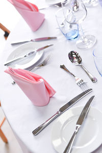 Table place setting seen from above of formal dinner party meal