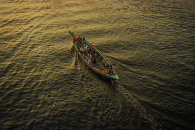 High angle view of boat sailing in water