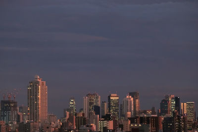 Illuminated cityscape at night