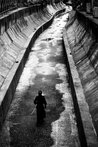 Woman in railroad track