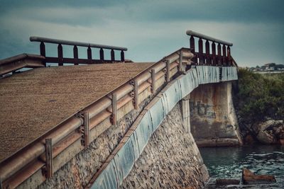 Bridge over river against sky