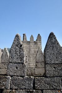 Low angle view of old ruin against the sky