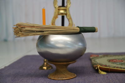 Close-up of lamp on table