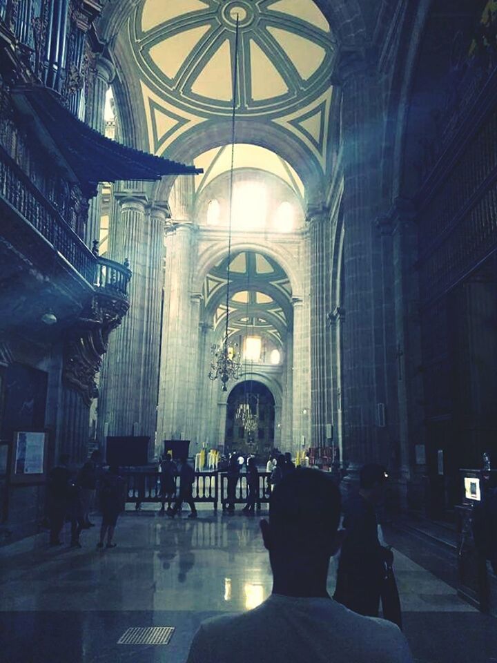 PEOPLE IN CORRIDOR OF TEMPLE